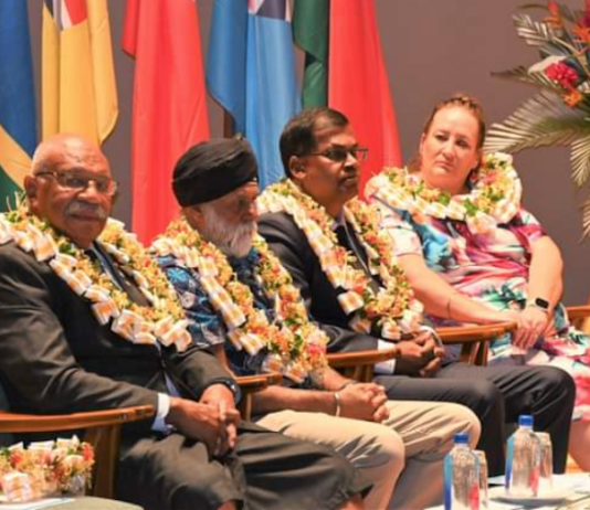 Fiji’s Prime Minister Sitiveni Rabuka (left) apologises to USP vice-chancellor Professor Pal Ahluwalia
