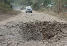 An airstrike narrowly misses a civilian vehicle in Myanmar