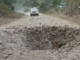 An airstrike narrowly misses a civilian vehicle in Myanmar