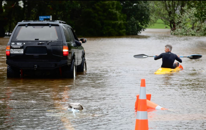 Flooding of a main road near Waimauku in the Auckland region