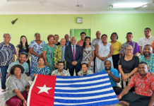 United Liberation Movement for West Papua president Benny Wenda (centre) with the Morning Star flag of independence and Fiji civil society members