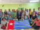 United Liberation Movement for West Papua president Benny Wenda (centre) with the Morning Star flag of independence and Fiji civil society members