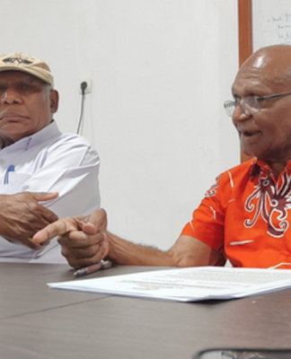 Reverend Benny Giai (left) and Reverend Rev. Socratez Sofyan Yoman at the Papuan Church Council