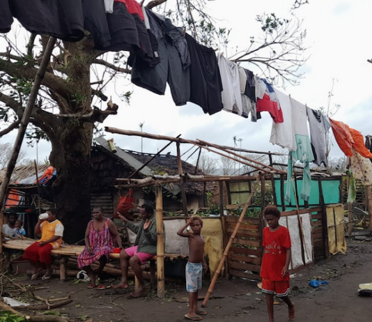 A ni-Vanuatu family at the Blacksands community in Port Vila on Efate Island in the wake of Tropical Cyclone Kevin