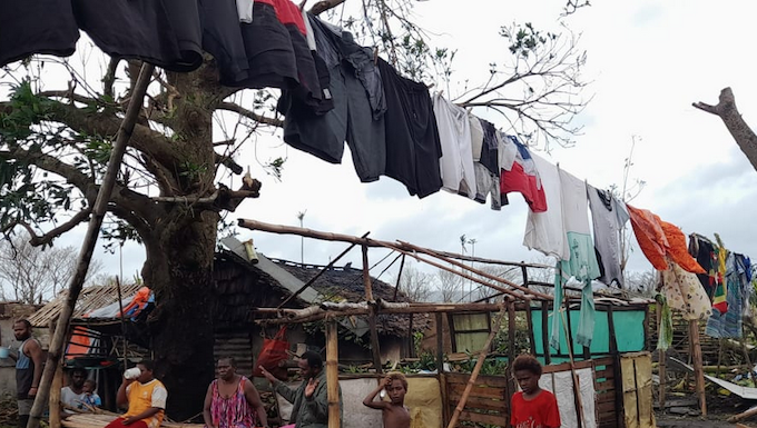 A ni-Vanuatu family at the Blacksands community in Port Vila on Efate Island in the wake of Tropical Cyclone Kevin