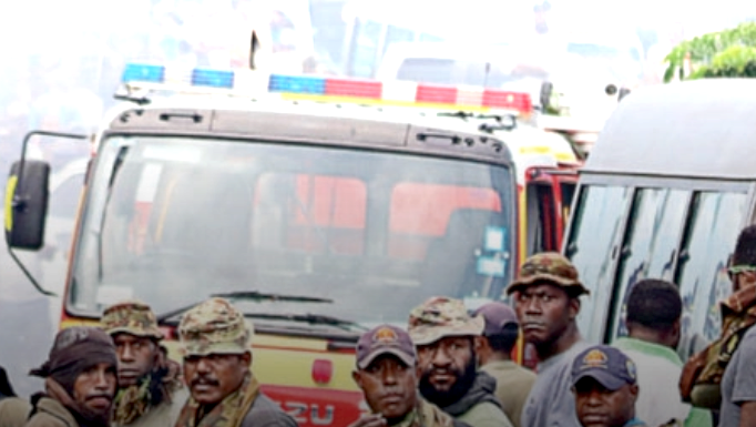 PNG soldiers shock with Boroko street takeover in security uproar PNG Defence Force soldiers keep watch after running riot in the Port Moresby suburb of Boroko