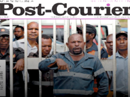 Papua New Guinean David Goli in his "chained" Port Moresby protest as he appeared on the front page of the Post-Courier in 2015