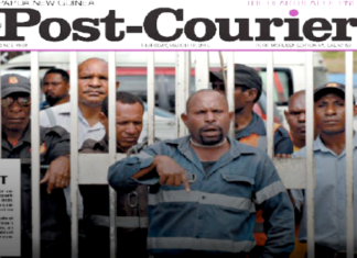 Papua New Guinean David Goli in his "chained" Port Moresby protest as he appeared on the front page of the Post-Courier in 2015
