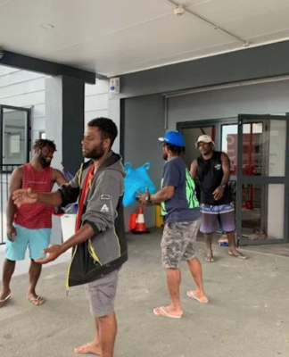 Ni-Vanuatu RSE workers helping unload donations after Cyclone Gabrielle
