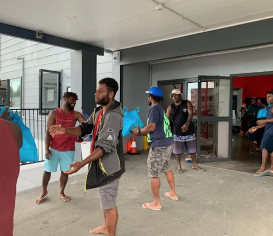 Ni-Vanuatu RSE workers helping unload donations after Cyclone Gabrielle