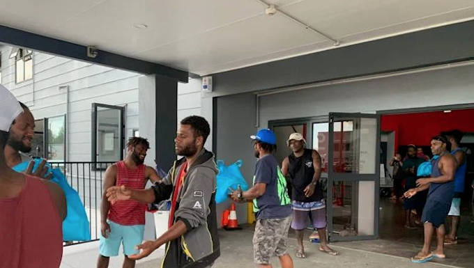 Ni-Vanuatu RSE workers helping unload donations after Cyclone Gabrielle