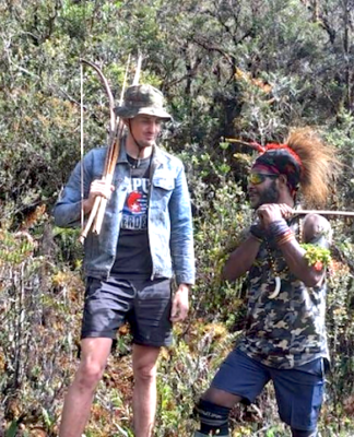 Pilot hostage Philip Mehrtens with one of his West Papuan rebel captors