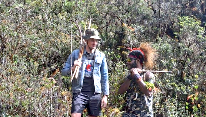 Pilot hostage Philip Mehrtens with one of his West Papuan rebel captors