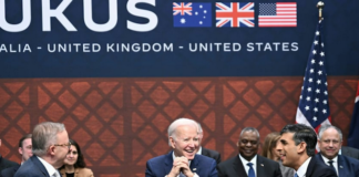 US President Joe Biden (centre) participates in a trilateral meeting with British Prime Minister Rishi Sunak (right) and Australia's Prime Minister Anthony Albanese