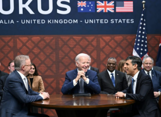 US President Joe Biden (centre) participates in a trilateral meeting with British Prime Minister Rishi Sunak (right) and Australia's Prime Minister Anthony Albanese