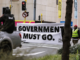 Rise in NZ disinformation, conspiracy theories prompts calls for election protections An anti-government protester in Wellington marching towards Parliament