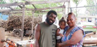 Frederica Atavi (right) with her son and husband Tom of Sisead village