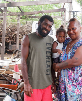 Frederica Atavi (right) with her son and husband Tom of Sisead village