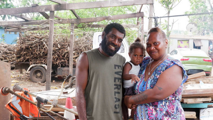Frederica Atavi (right) with her son and husband Tom of Sisead village