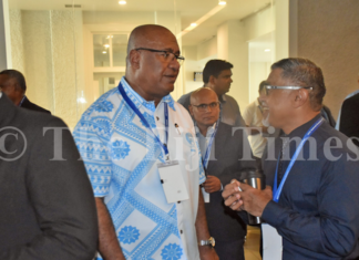 Health Secretary Dr James Fong (right) speaks to Deputy Prime Minister Manoa Kamikamica