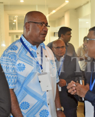 Mass migration of Fiji nurses may be curbed soon, says health chief Health Secretary Dr James Fong (right) speaks to Deputy Prime Minister Manoa Kamikamica