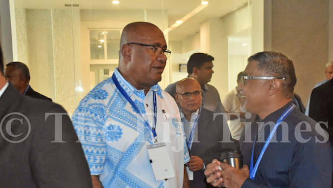 Health Secretary Dr James Fong (right) speaks to Deputy Prime Minister Manoa Kamikamica