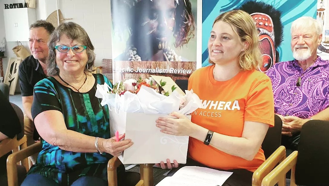 Asia Pacific Media Network chair Dr Heather Devere presents a bouquet to Tuwhera's Donna Coventry