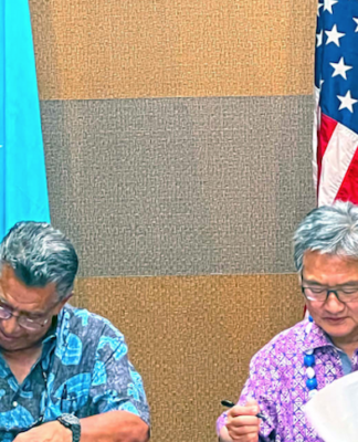 US envoy gets two of three north Pacific nations to sign defence deals FSM Chief Negotiator Leo Falcam Jr (left) and US Presidential Envoy Joseph Yun in Pohnpei