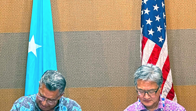 FSM Chief Negotiator Leo Falcam Jr (left) and US Presidential Envoy Joseph Yun in Pohnpei