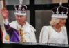 King Charles III and Queen Camilla wave from the balcony at Buckingham Palace