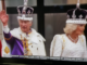 King Charles III and Queen Camilla wave from the balcony at Buckingham Palace