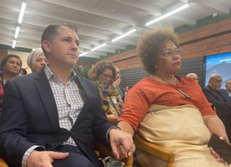 A public meeting that included government minister Michael Wood