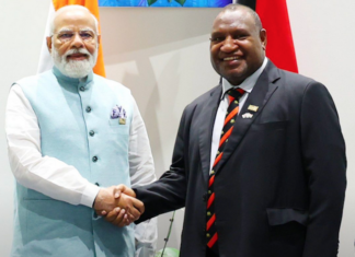 India's Prime Minister Narendra Modi (left) with PNG Prime Minister James Marape