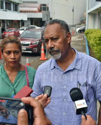 People's Alliance party general secretary Sakiasi Ditoka and party deputy leader Lynda Tabuya speaking to news media