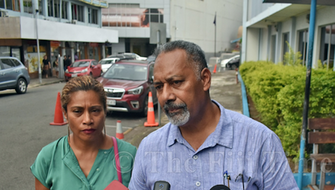People's Alliance party general secretary Sakiasi Ditoka and party deputy leader Lynda Tabuya speaking to news media