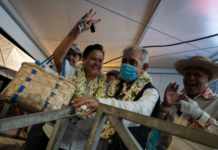 Pro-independence leader and former president of French Polynesia Oscar Temaru celebrates victory