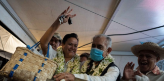 Pro-independence leader and former president of French Polynesia Oscar Temaru celebrates victory