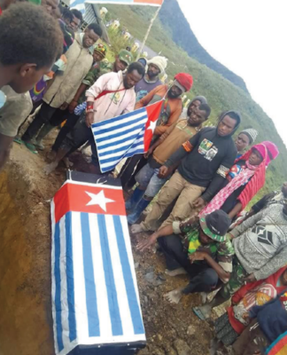 OPM leader calls on Biden to take proactive role in ending West Papuan ‘holocaust’ West Papuan Morning Star flag at burial