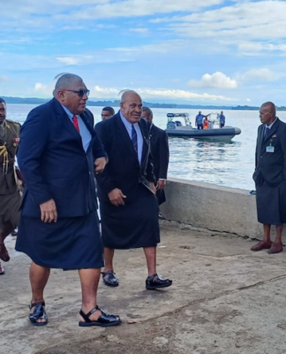 Fiji's President Ratu Wiliame Katonivere (front centre) arrrives on Bau Island