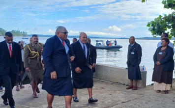 Fiji's President Ratu Wiliame Katonivere (front centre) arrrives on Bau Island