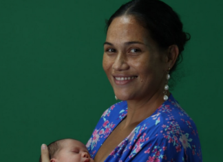 Tahitian anti-nuclear activist Hinamoeura Cross and her baby Marunui