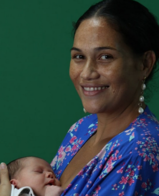 Tahitian anti-nuclear activist Hinamoeura Cross and her baby Marunui