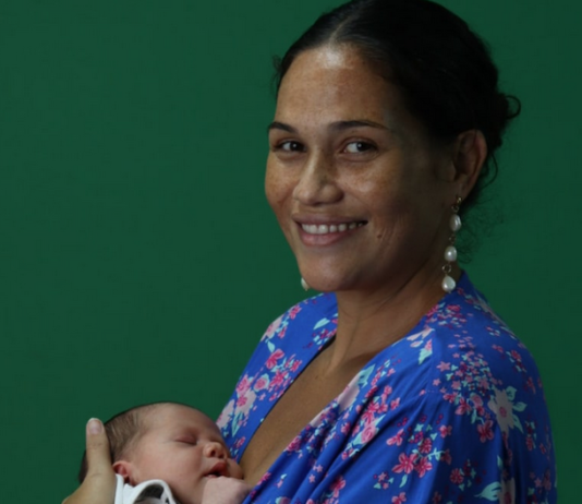 Tahitian anti-nuclear activist Hinamoeura Cross and her baby Marunui