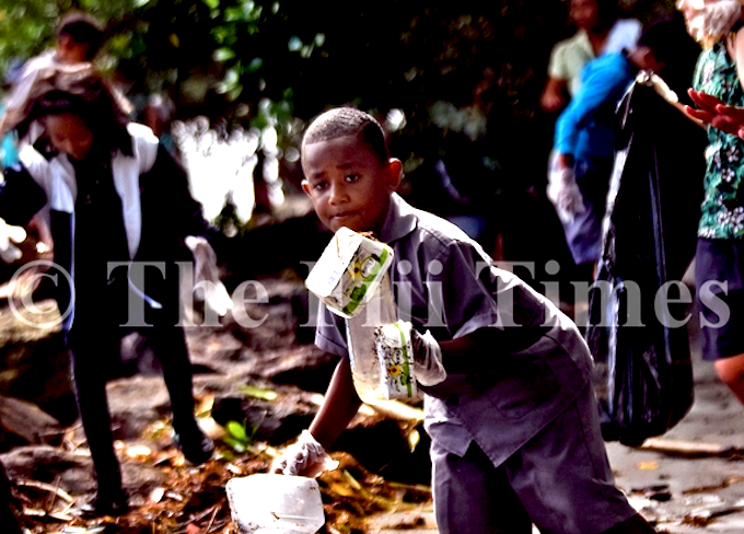 Veiuto Primary School Year 2 student Josaia Waqaivolavola takes part in the beach clean up at the My Suva Picnic Park along the Nasese foreshore in Suva