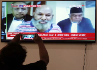 Papuan Governor Lukas Enembe and members of his legal team