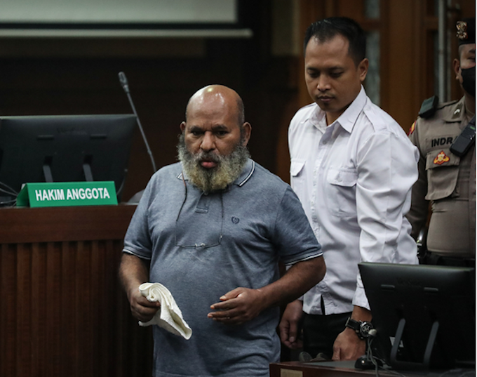 The suspended Governor of Papua, Lukas Enembe, enters Jakarta's Corruption Criminal Court on 19 June 2023