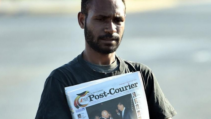 Mr Speaker, we’re not your enemies. We’re reporting without fear or favour A PNG Post-Courier newsboy on the streets in Port Moresby