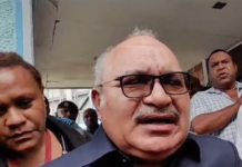 PNG former prime minister Peter O'Neill outside Boroko Police Station
