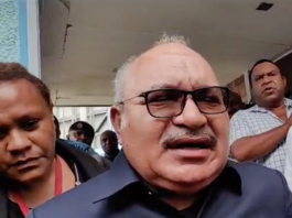 PNG former prime minister Peter O'Neill outside Boroko Police Station