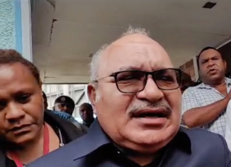 PNG former prime minister Peter O'Neill outside Boroko Police Station